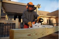 Stihl Battery Chainsaw MSA 160 cutting a block